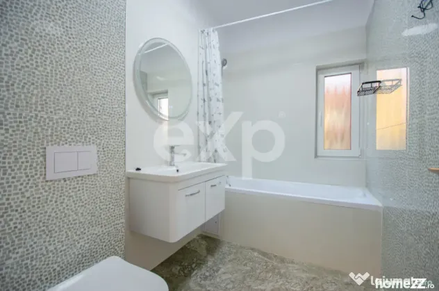 De închiriat apartament 2 camere cu loc parcare