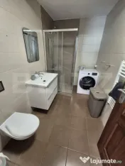 Apartament cu 3 camere, 2 băi, intermediar Parcare subteran 