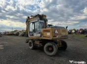 Dezmembrez excavator pe roti Liebherr 902 