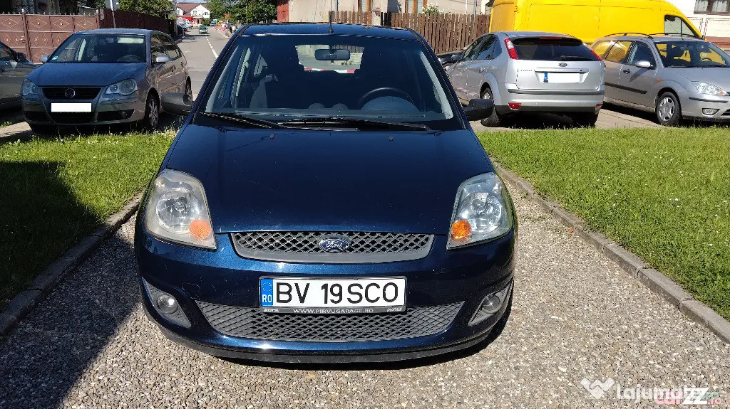 FORD FIESTA 2006 ,1.25 BENZINA,5 USI, clima,computer de bord,roti iarna si vara