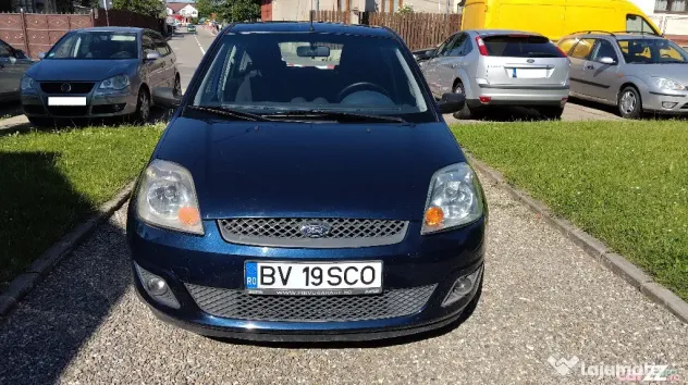 FORD FIESTA 2006 ,1.25 BENZINA,5 USI, clima,computer de bord,roti iarna si vara