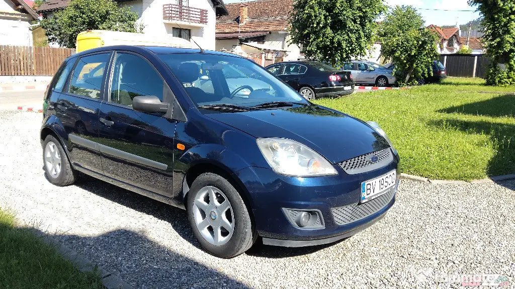 FORD FIESTA 2006 ,1.25 BENZINA,5 USI, clima,computer de bord,roti iarna si vara