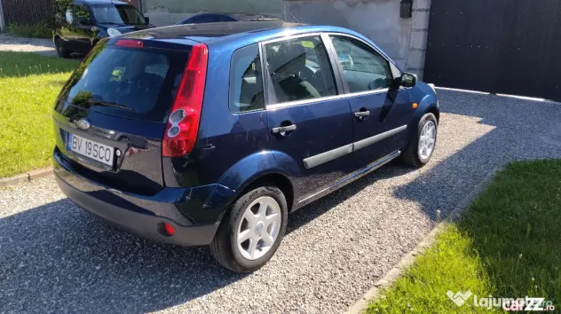 FORD FIESTA 2006 ,1.25 BENZINA,5 USI, clima,computer de bord,roti iarna si vara