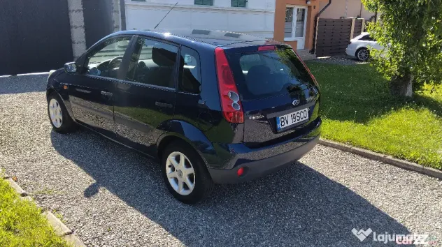 FORD FIESTA 2006 ,1.25 BENZINA,5 USI, clima,computer de bord,roti iarna si vara