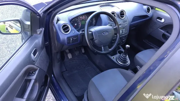 FORD FIESTA 2006 ,1.25 BENZINA,5 USI, clima,computer de bord,roti iarna si vara