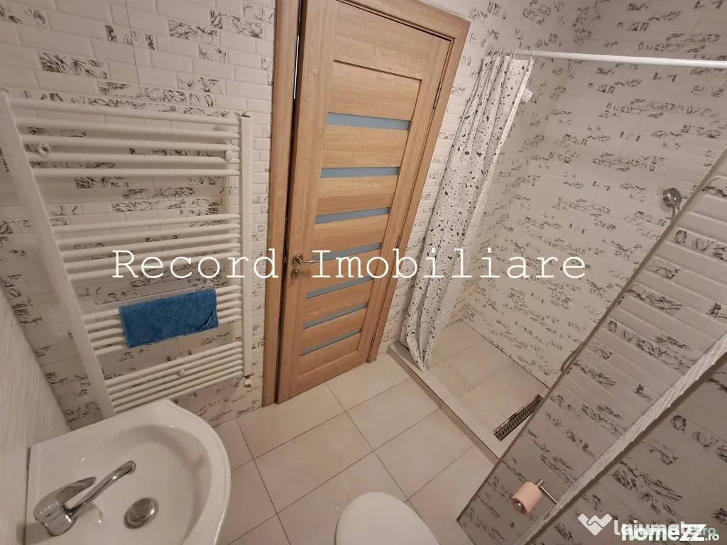 Apartament 3 camere,2 bai,et.1,balcon,parcare subterana! zona Marasti