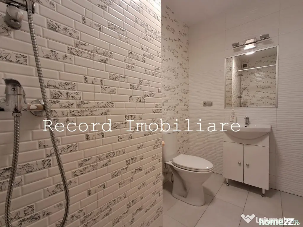 Apartament 3 camere,2 bai,et.1,balcon,parcare subterana! zona Marasti