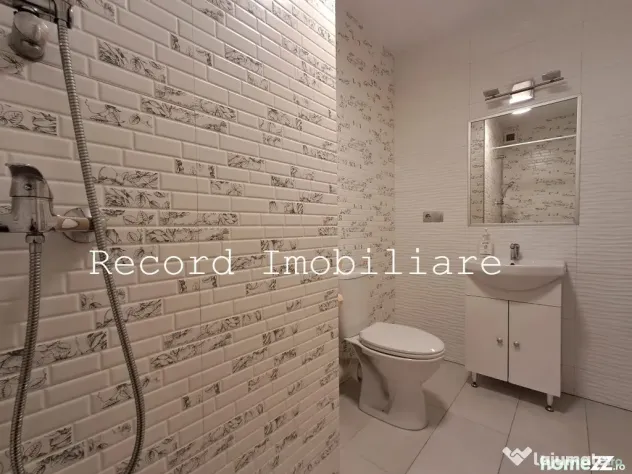 Apartament 3 camere,2 bai,et.1,balcon,parcare subterana! zona Marasti