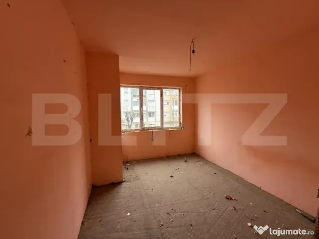 Bloc cu 2 etaje, aflat în zona centrală a orașului Cugir