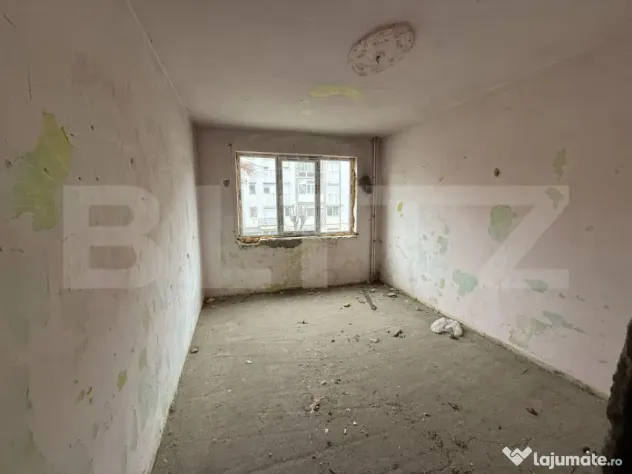 Bloc cu 2 etaje, aflat în zona centrală a orașului Cugir