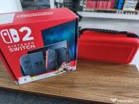 Vând Consola Nintendo Switch 2 cu geantă transport și folie protecție. 7 jocuri 