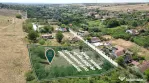 Teren intravilan de 2593 mp, pe deal, cu vedere catre sat, i
