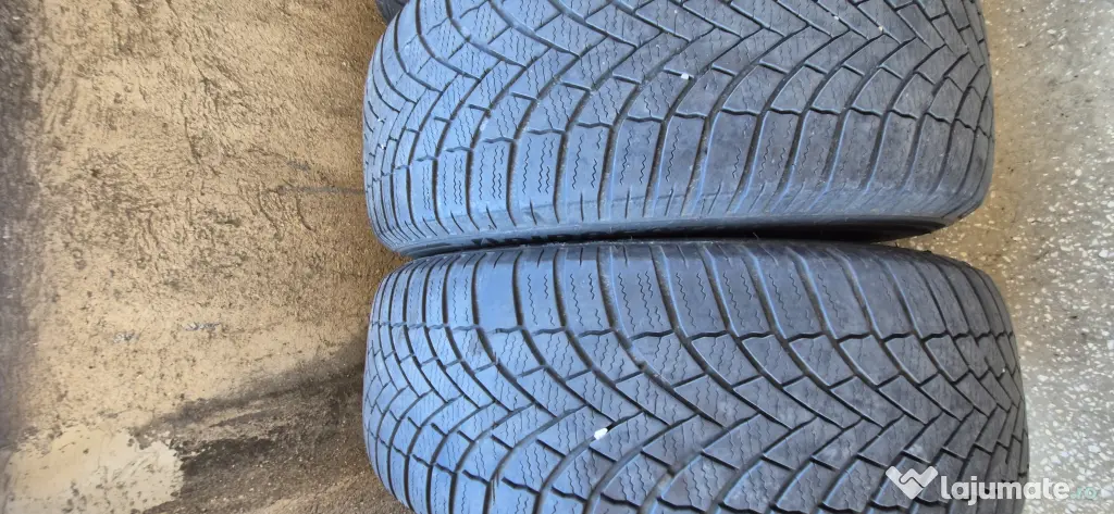 Set 4 jante otel + anvelope iarna 205/55/R16 91H/94H Bridgestone / UNIROYAL