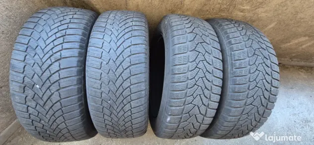 Set 4 jante otel + anvelope iarna 205/55/R16 91H/94H Bridgestone / UNIROYAL