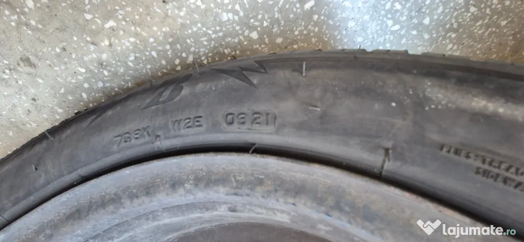 Set 4 jante otel + anvelope iarna 205/55/R16 91H/94H Bridgestone / UNIROYAL