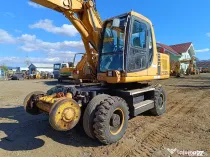 Excavator rutier–feroviar Komatsu PW170-ES, 21 tone, 2003