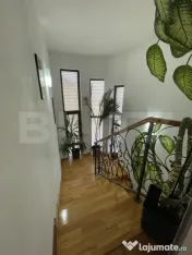 Casă cu 4 dormitoare, terasă de 50 mp, garaj și teren 500 