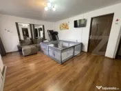 Casă cu 4 dormitoare, terasă de 50 mp, garaj și teren 500 