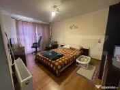 Casă cu 4 dormitoare, terasă de 50 mp, garaj și teren 500 