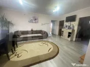 Casă cu 4 dormitoare, terasă de 50 mp, garaj și teren 500 