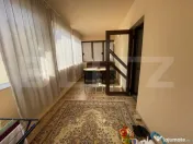 Casă cu 4 dormitoare, terasă de 50 mp, garaj și teren 500 