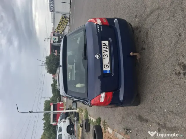 Vând skoda fabia 2. 1,2 benzina 2012.