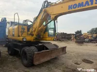 Dezmembrez excavator pe roti Komatsu PW160