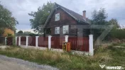 Casa de lemn cu teren 1000 mp Livezeni 