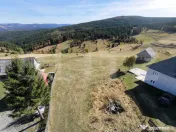 Teren intravilan 3.728 mp, front la drum asfaltat, priveliș
