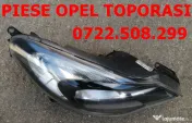 faruri Opel Corsa D facelift fond negru 
