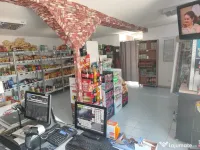 Teren + magazin în functiune 