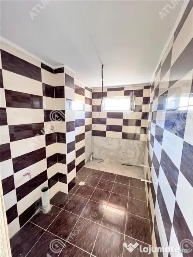 Apartament 4 camere 2 bai balcon situat in zona Rahovei Sib