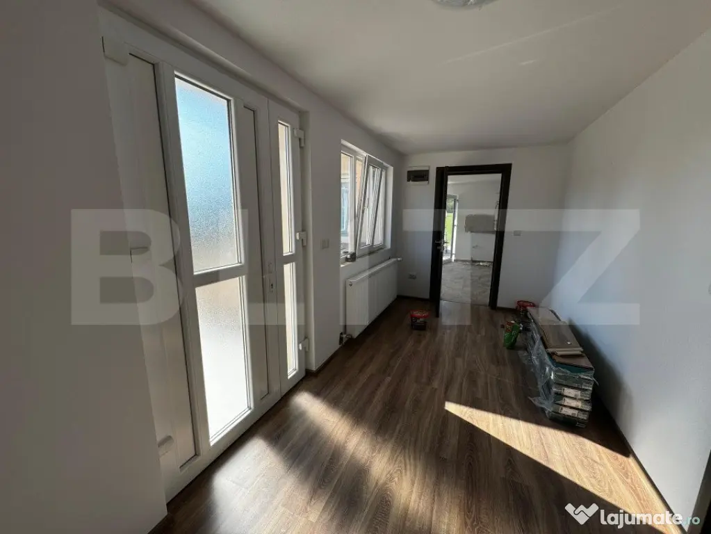 Casă cu 5 camere și spațiu comercial, teren 4079mp, zona - Teius (Alba)