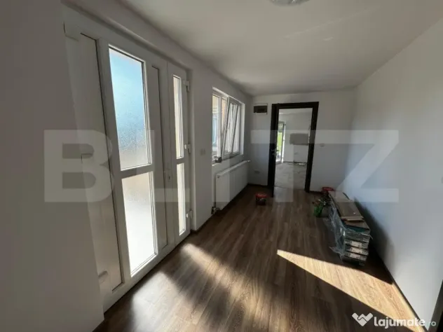 Casă cu 5 camere și spațiu comercial, teren 4079mp, zona - Teius (Alba)