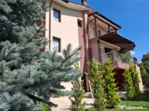 Proprietate elegantă cu teren mare și garaj în Bucium, pe