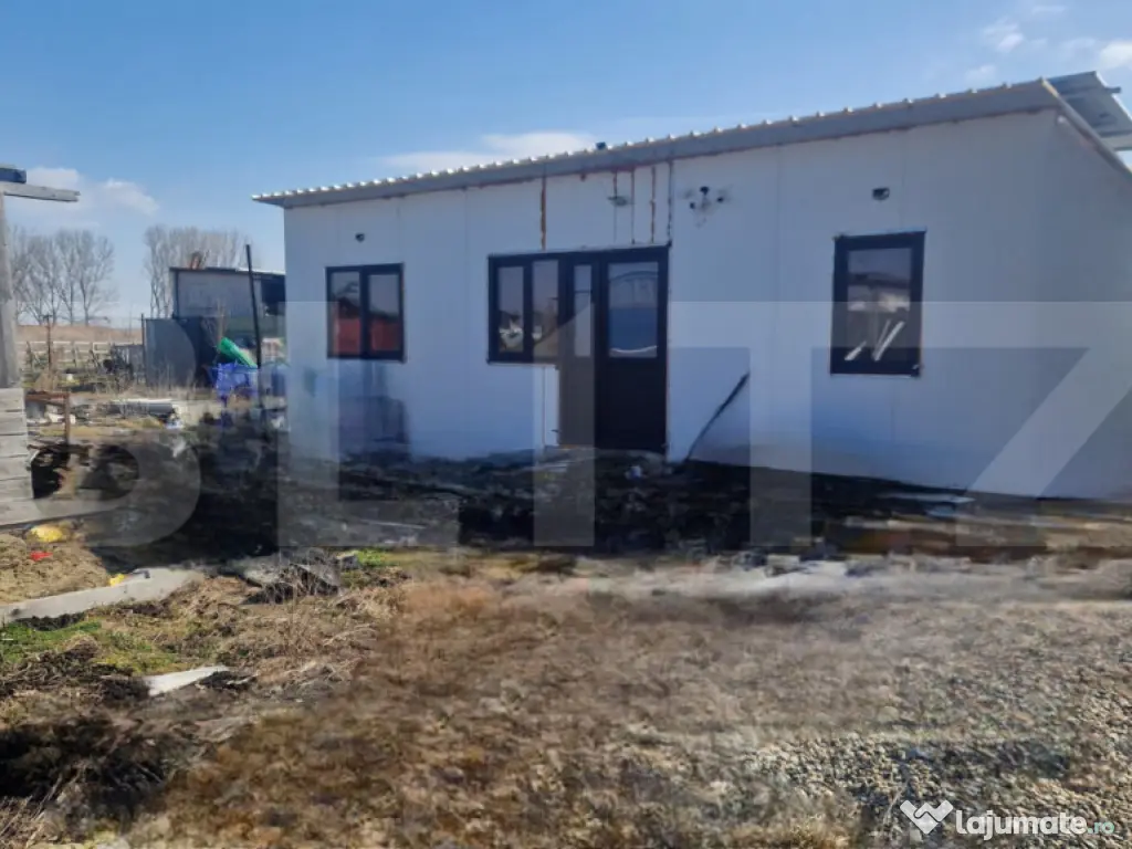 TEREN 520 MP INTRAVILAN +ANEXE-ctie cu panouri sandwich pe