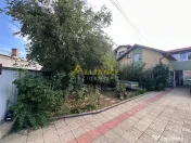 Casa individuala cu curte proprie si spatiu comercial 