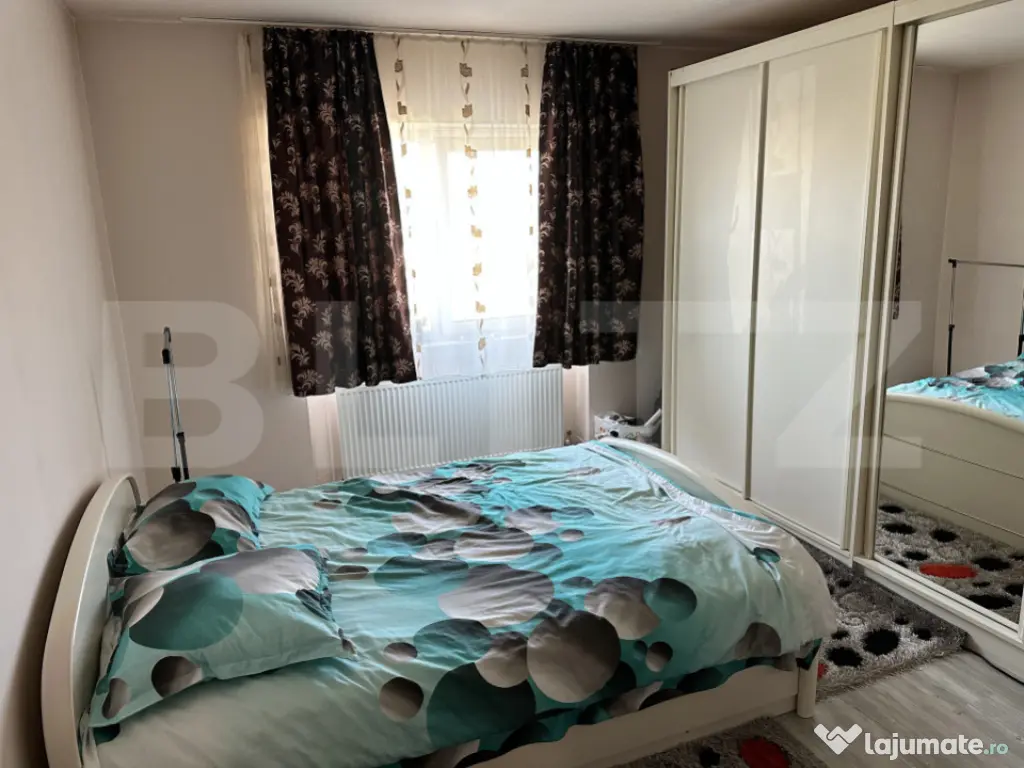 Casă spațioasă într-o zonă liniștită – curte amenaj