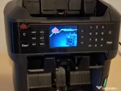 Masina de numarat bani aproape noua