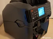 Masina de numarat bani aproape noua