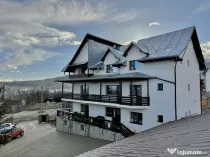 Pensiune 12 camere + 33 ari de teren Solca