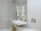 Apartament de lux la parter, cu terasă și piscină, situat într-o zonă premium