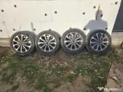Vând roți Nissan cu anvelope de iarnă 18 inch 