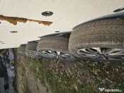 Vând roți Nissan cu anvelope de iarnă 18 inch 
