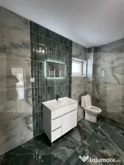 Casa individuala cu garaj - 143 mp Amprenta la sol + 710 mp 