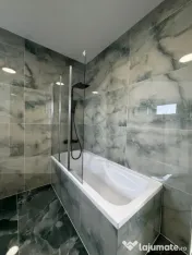 Casa individuala cu garaj - 143 mp Amprenta la sol + 710 mp 