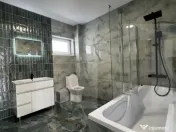 Casa individuala cu garaj - 143 mp Amprenta la sol + 710 mp 