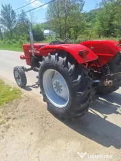 Tractor Univesal 550, cutie viteza 2 manete, ambreiaj priza la mana, servo 