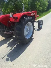 Tractor Univesal 550, cutie viteza 2 manete, ambreiaj priza la mana, servo 