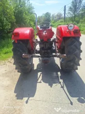 Tractor Univesal 550, cutie viteza 2 manete, ambreiaj priza la mana, servo 